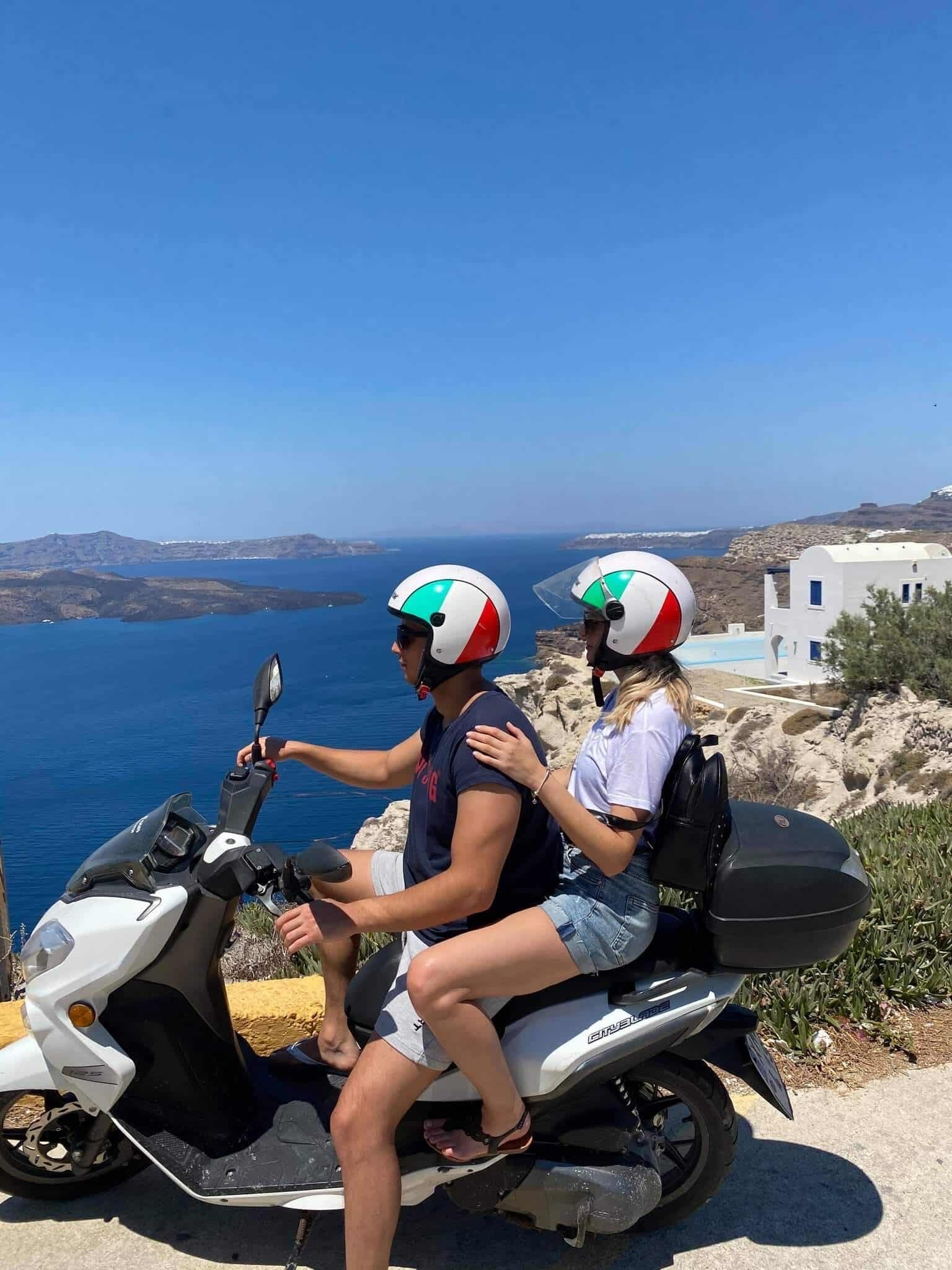 Blue-domed church and caldera view in Santorini